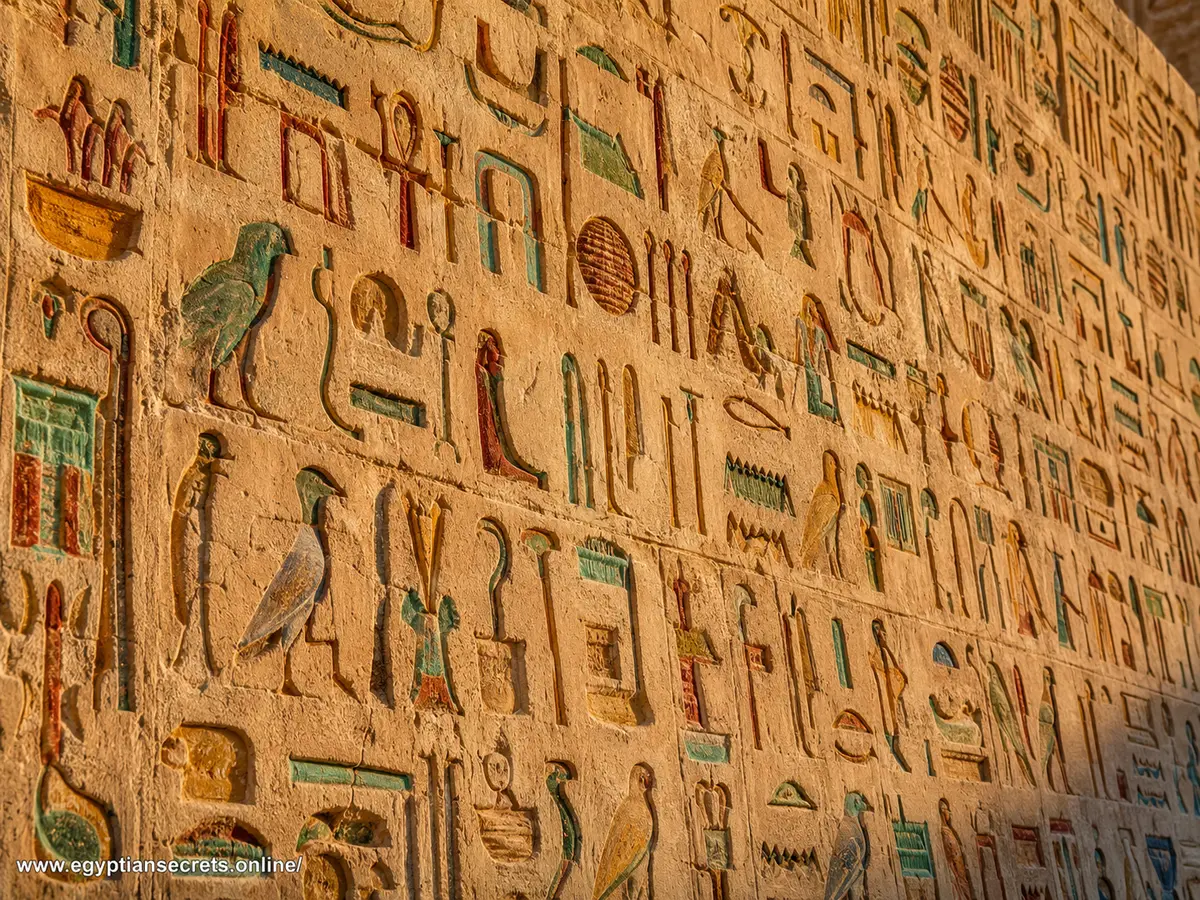 Painted Book of the Dead papyrus showing figures and columns of hieroglyphic text