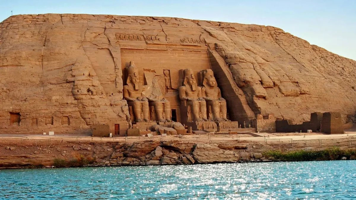 The Great Temple of Abu Simbel with four seated statues of Ramesses II and Lake Nasser